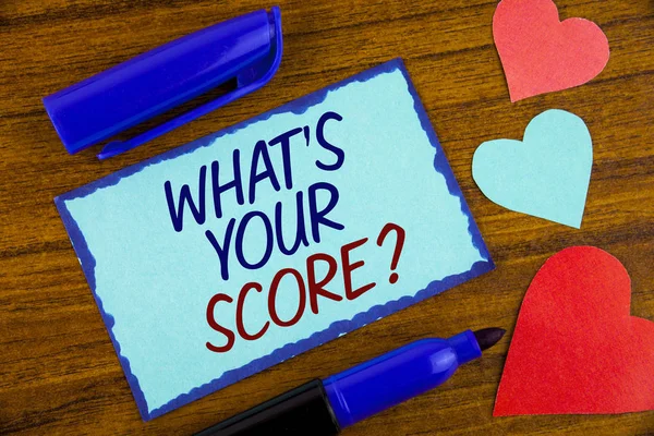 Writing note showing  What Is Your Score Question. Business photo showcasing Tell Personal Individual Rating Average Results written on Sticky note paper on the wooden background Hearts next to it