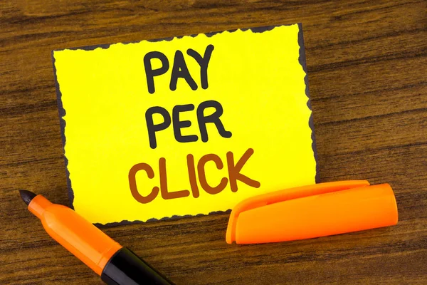 Conceptual hand writing showing Pay Per Click. Business photo showcasing Get money from visitors Ads Advertising SEO Marketing written on Yellow Sticky note paper wooden background Marker — Stock Photo, Image