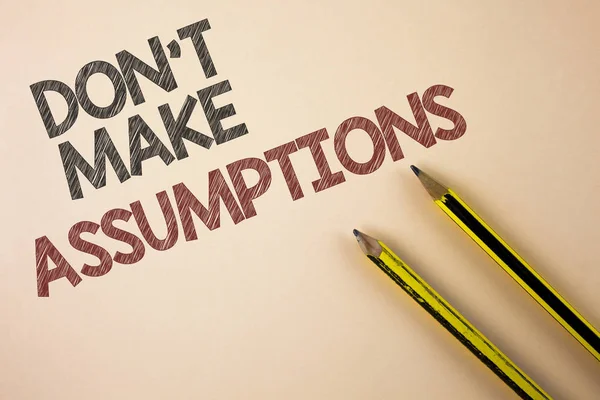Writing note showing  Do not Make Assumptions. Business photo showcasing predict events future without clue Alternative Facts written on Plain background Pencils next to it. — Stock Photo, Image