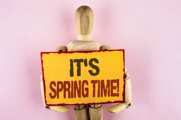 Conceptual hand writing showing It is Spring Time Motivational Call. Business photo text Month with great weather Sunny Flowers written on Sticky note paper Wooden Robot Toy plain background. — Stock Photo, Image