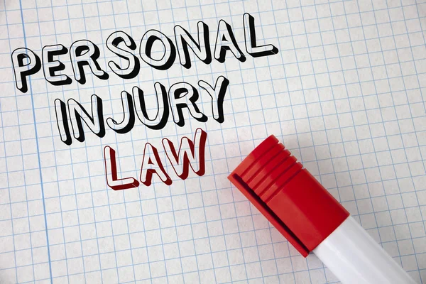 Handwriting text Personal Injury Law. Concept meaning guarantee your rights in case of hazards or risks written on Notebook Paper Marker next to it. Top view.