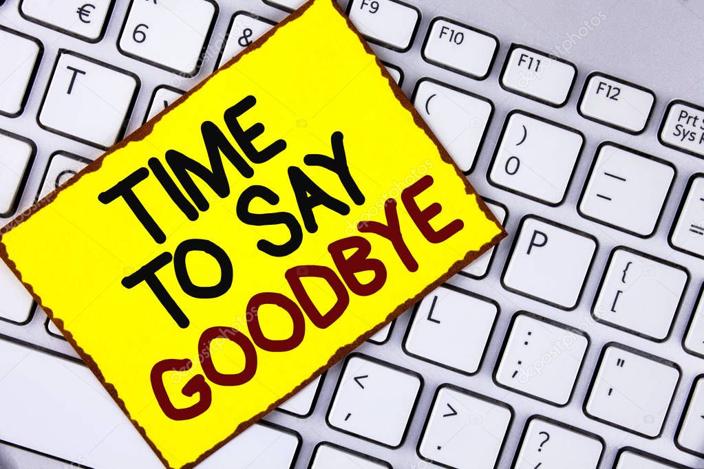 Handwriting text Time To Say Goodbye. Concept meaning Separation Moment Leaving Breakup Farewell Wishes Ending written on Yellow Sticky Note Paper placed on the Laptop.
