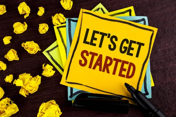 Conceptual hand writing showing Lets Get Started. Business photo showcasing beginning time motivational quote Inspiration encourage written on Sticky Note Paper on wooden background Paper Balls — Stock Photo, Image