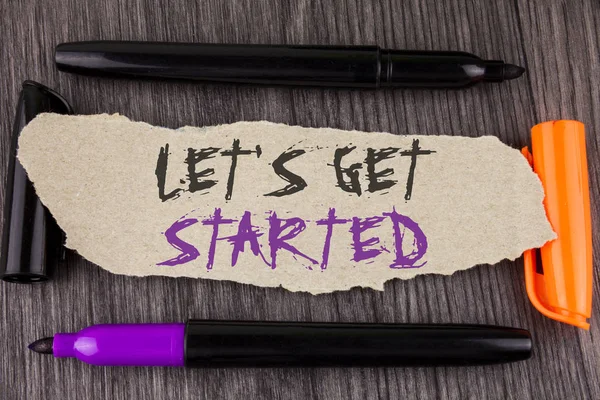 Text sign showing Lets Get Started. Conceptual photo beginning time motivational quote Inspiration encourage written on Tear Cardboard Paper on the wooden background Markers next to it. — Stock Photo, Image
