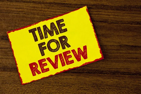 Handwriting text writing Time For Review. Concept meaning Giving Feedback Evaluation Rate job test or product Qualify written on Yellow Sticky note paper on the wooden background.