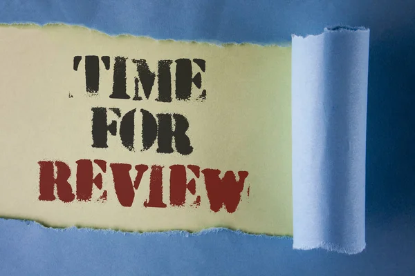 Writing note showing  Time For Review. Business photo showcasing Giving Feedback Evaluation Rate job test or product Qualify written under Tear Folded paper on plain White background.