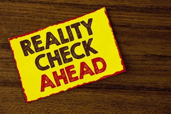 Handwriting text writing Reality Check Ahead. Concept meaning Unveil truth knowing actuality avoid being sceptical written on Yellow Sticky note paper on the wooden background. — Stock Photo, Image
