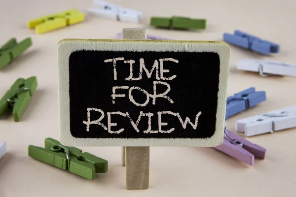 Conceptual hand writing showing Time For Review. Business photo showcasing Giving Feedback Evaluation Rate job test or product Qualify written on Wooden Notice Board plain background Wooden Clips