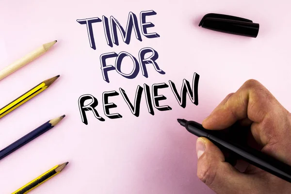 Word writing text Time For Review. Business concept for Giving Feedback Evaluation Rate job test or product Qualify written by Man on plain background holding Marker Pencils next to it.