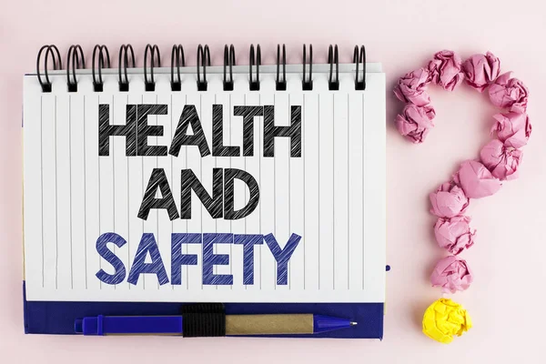 Handwriting text Health And Safety. Concept meaning being in good condition harmless Workouts Healthy food written on Notebook Book on the plain background Pen next to it Ask for.