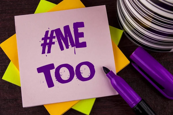 Text sign showing Me Too. Conceptual photo Grow strong and brave enough to report abuse, harassment, assault written on Sticky note paper on wooden background Marker and Cup next to it.