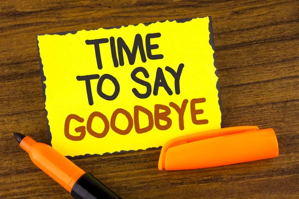 Conceptual hand writing showing Time To Say Goodbye. Business photo showcasing Separation Moment Leaving Breakup Farewell Wishes Ending written on Yellow Sticky note paper wooden background Marker — Stock Photo, Image