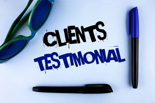 Conceptual hand writing showing Clients Testimonial. Business photo showcasing Customers Personal Experiences Reviews Opinions Feedback written on plain background Markers Sun Glasses next to it.