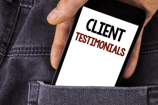 Conceptual hand writing showing Client Testimonials. Business photo text Customer Personal Experiences Reviews Opinions Feedback written on Mobile Phone holding by man on the Jeans background.