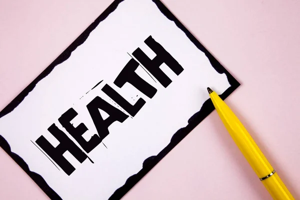 Handwriting text Health. Concept meaning State of being free from Illness Injuries Mental Physical condition written on White Sticky note paper on plain Pink background Pen next to it. — Stock Photo, Image