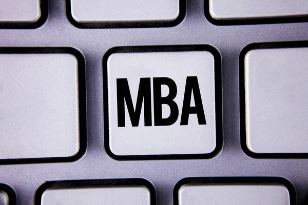 Word writing text Mba. Business concept for Master of Business Administration Advance Degree After College Studies written on White Keyboard Key with copy space. Top view.