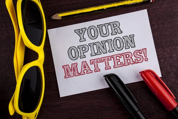 Writing note showing  Your Opinion Matters Motivational Call. Business photo showcasing Client Feedback Reviews are important written on Sticky Note Paper on wooden background Pen Pencil Glasses