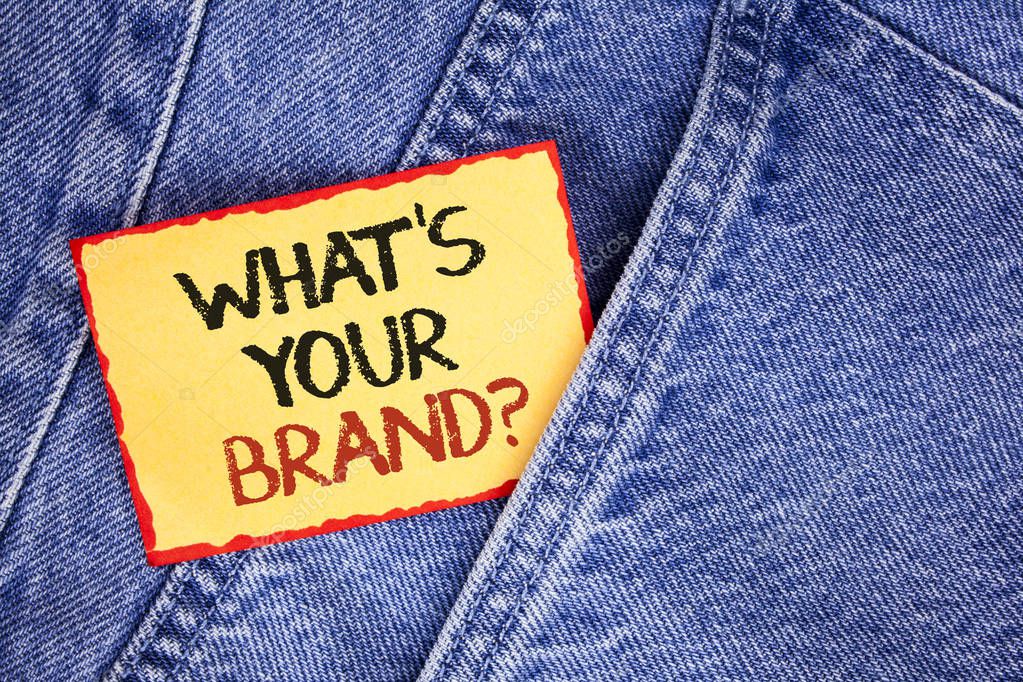 Writing note showing  What Is Your Brand Question. Business photo showcasing Define Individual trademark Identify Company written Sticky Note Paper the Jeans background.