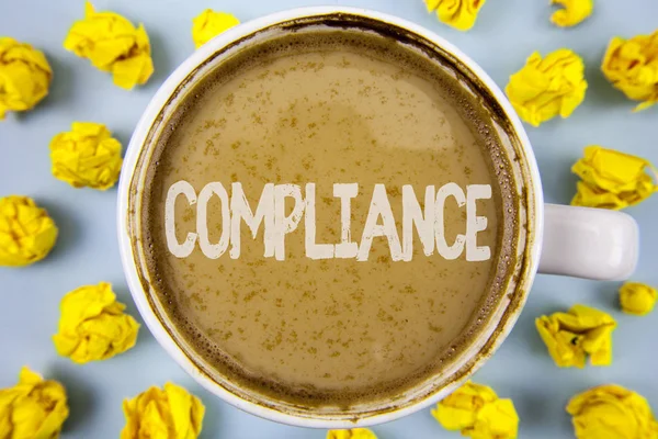 Conceptual hand writing showing Compliance. Business photo text Technology Company sets its policy standard regulations written on Coffee in Cup within Paper Balls on plain background.