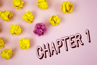 Text sign showing Chapter 1. Conceptual photo Starting something new or making the big changes in one s journey written on plain Pink background Crumpled Paper Balls next to it. clipart