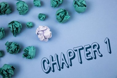 Handwriting text writing Chapter 1. Concept meaning Starting something new or making the big changes in one s journey written on Plain Blue background Crumpled Paper Balls next to it. clipart