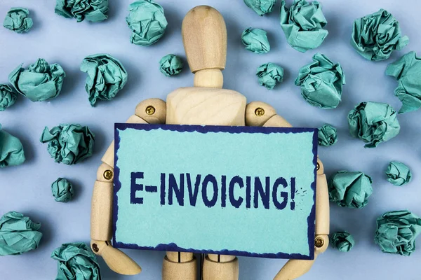 Word writing text E-Invoicing Motivational Call. Business concept for Company encourages use of digital billing written on Sticky note paper within Paper Balls on plain background Jointed Toy