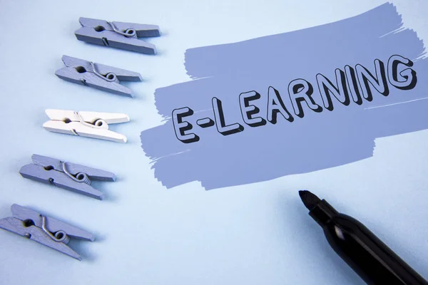 Conceptual hand writing showing E-Learning. Business photo text Introduction of an electronic education in modern schools written on Painted background wooden Clips and Marker next to it. — Stock Photo, Image