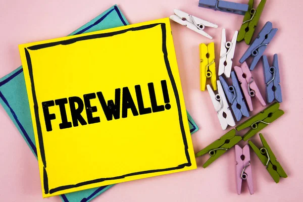Text sign showing Firewall Motivational Call. Conceptual photo Malware protection prevents internet frauds written on Sticky Note Paper on plain background Paper Balls and Wooden Clips.