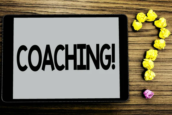 Conceptual hand writing showing Coaching Motivational Call. Business photo showcasing Tough training begins to improve your skills written on Tablet Screen wooden background Paper Ball Ask for — Stock Photo, Image