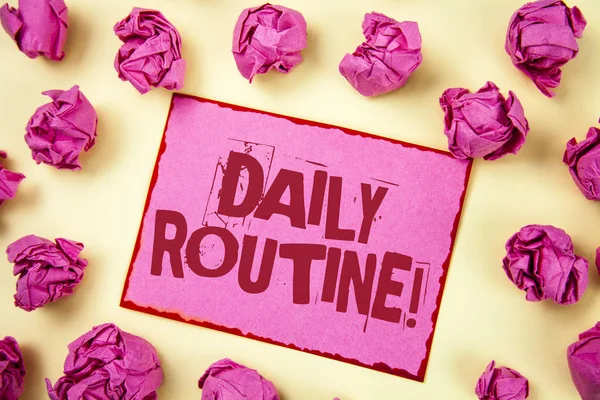 Writing note showing  Daily Routine Motivational Call. Business photo showcasing Everyday good habits to bring changes written on Pink Sticky Note Paper on plain background Pink Paper Balls.