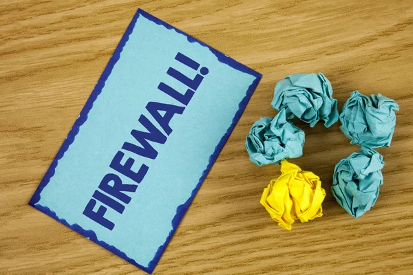 Word writing text Firewall Motivational Call. Business concept for Malware protection prevents internet frauds written on Sticky Note paper on wooden background Paper Balls next to it.