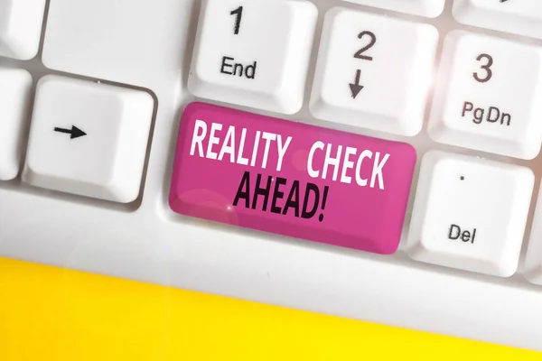 Text sign showing Reality Check Ahead. Conceptual photo makes them recognize truth about situations or difficulties White pc keyboard with empty note paper above white background key copy space. — Stock Photo, Image