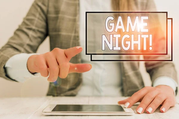 Writing note showing Game Night. Business photo showcasing usually its called on adult play dates like poker with friends Business woman sitting with mobile phone on the table. — Stock Photo, Image