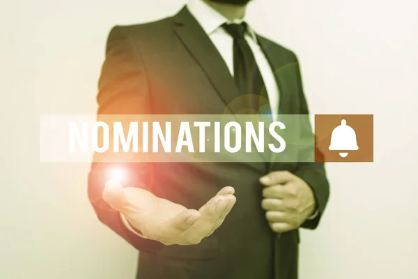 Tekst pisma nominacje. Biznes koncepcja działania nominacji lub nominacji państwa do nagrody Mężczyzna z brodą nosić formalny strój roboczy ubrania podnoszące jedną rękę w górę. — Zdjęcie stockowe