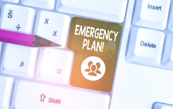 Handwriting text writing Emergency Plan. Concept meaning actions developed to mitigate damage of potential events White pc keyboard with empty note paper above white background key copy space. — Stock Photo, Image