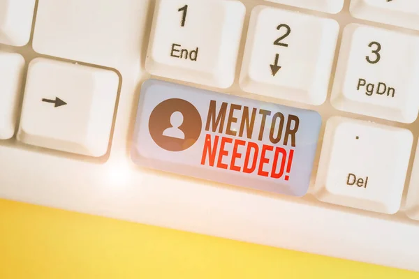 Word writing text Mentor Needed. Business concept for Employee training under senior assigned act as advisor White pc keyboard with empty note paper above white background key copy space.