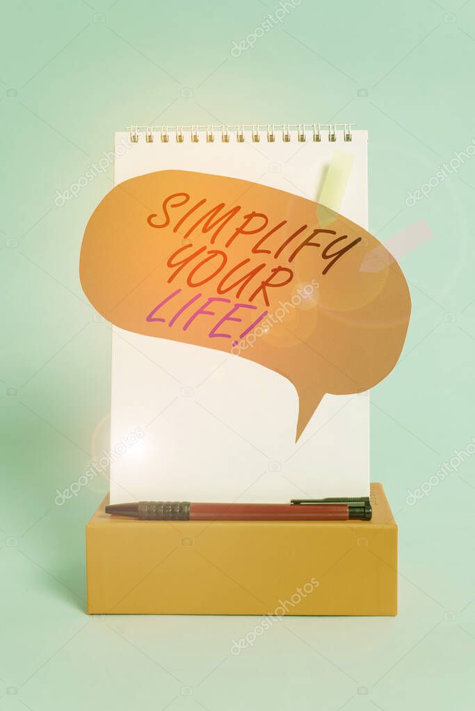 Word writing text Simplify Your Life. Business concept for focused on important and let someone else worry about less ones Notepad box speech bubble arrow banners ballpoint cool pastel background.