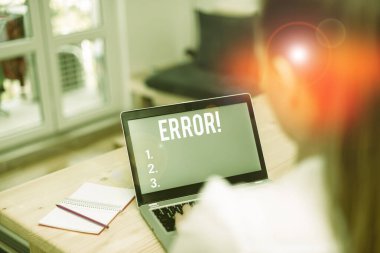Word writing text Error. Business concept for state or condition of being wrong in conduct judgement or program woman laptop computer office supplies technological devices inside home.