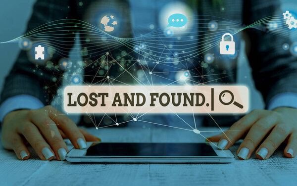 Conceptual hand writing showing Lost And Found. Business photo showcasing a place where lost items are stored until they reclaimed Picture photo network scheme with modern smart device.