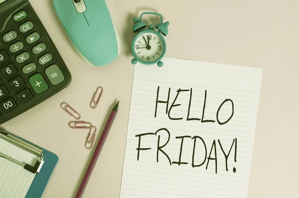 Handwriting text Hello Friday. Concept meaning used to express happiness from beginning of fresh week Calculator clips clock clipboard mouse sheet pencil colored background.