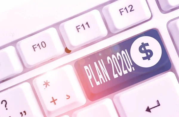 Ord skrivning text plan 2020. Affärsidé för detaljerat förslag att uppnå något nästa år vit PC-tangentbord med tomt anteckningspapper ovanför vit bakgrund nyckel kopiera utrymme. — Stockfoto
