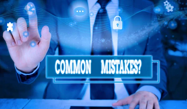 Text sign showing Common Mistakes question. Conceptual photo repeat act or judgement misguided or wrong Picture photo system network scheme modern technology smart device. — Stock Photo, Image