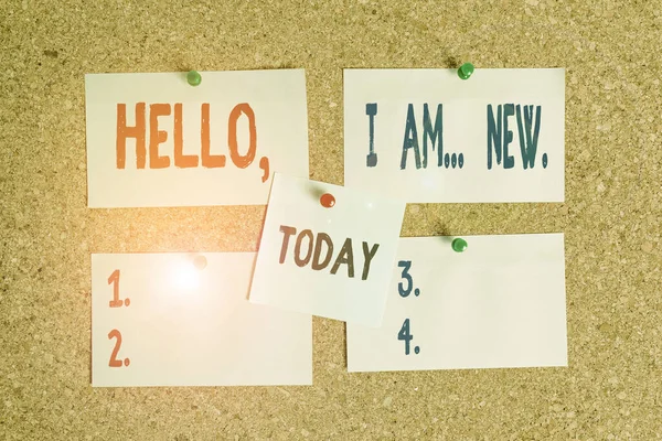 Text sign showing Hello I Am New. Conceptual photo introducing oneself in a group as fresh worker or student Corkboard color size paper pin thumbtack tack sheet billboard notice board.