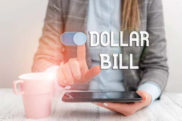 Text sign showing Dollar Bill. Conceptual photo a piece of paper money worth one dollar Federal Reserve note Business woman sitting with mobile phone and cup of coffee on the table.