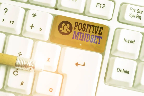 Text sign showing Positive Mindset. Conceptual photo mental attitude in wich you expect favorable results White pc keyboard with empty note paper above white background key copy space. — Stock Photo, Image
