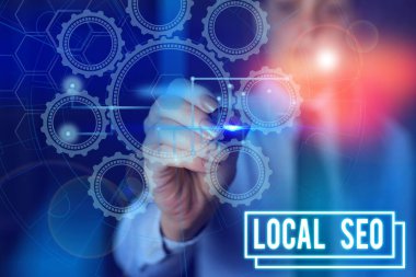 Writing note showing Local Seo. Business photo showcasing helps businesses promote products and services to local customers Picture photo network scheme with modern smart device.