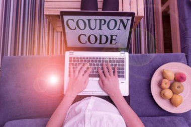 Word writing text Coupon Code. Business concept for ticket or document that can be redeemed for a financial discount woman laptop computer office supplies technological devices inside home.
