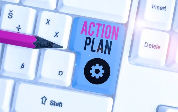 Word writing text action plan. Geschäftskonzept für detaillierte Pläne, die Maßnahmen skizzieren, die erforderlich sind, um Ziele zu erreichen oder Vision weiße PC-Tastatur mit leerem Notizpapier über weißem Hintergrund Schlüsselkopierraum. — Stockfoto