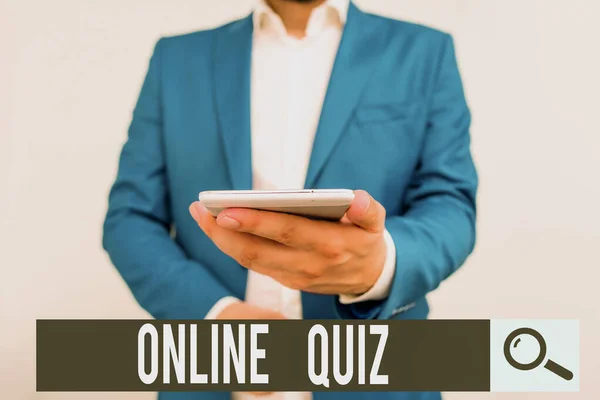 Writing note showing Online Quiz. Business photo showcasing game or a mind sport that are published on the Internet Business concept with man holding mobile phone with touch screen.