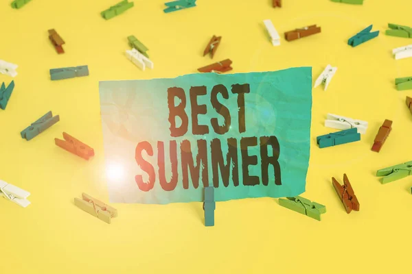 Conceptual hand writing showing Best Summer. Business photo showcasing weather is warmer and analysisy students get a break from school Colored clothespin papers empty reminder yellow floor office. — Stockfoto
